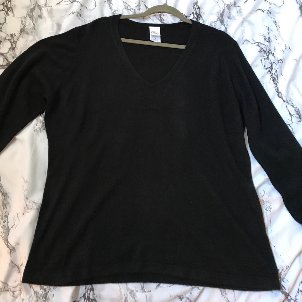 Gently worn black sweater.